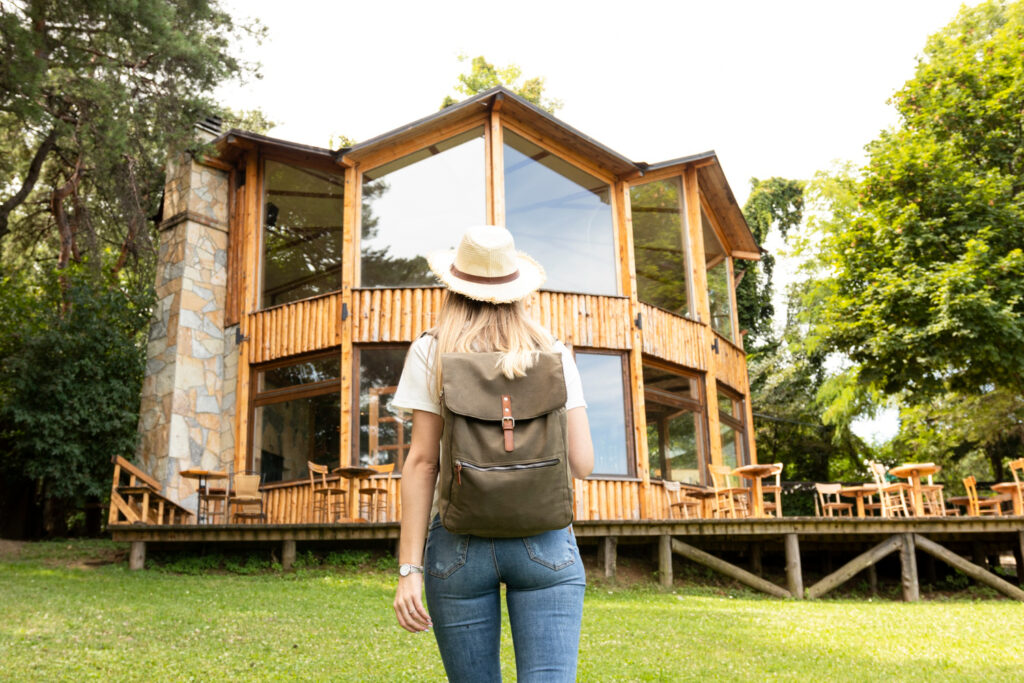 Girl looing digital painting of Whiteshell Lakefront cottages for sale.